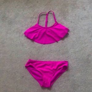 bright magenta bathing suit